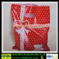 die-cut-handle-bag09 gift packing use die cut handle plastic bags 